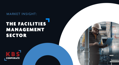 Market insight graphic titled “The Facilities Management Sector” with KBS Corporate branding. The design features dark blue and white geometric shapes alongside a photo of a facilities professional wearing a hard hat and safety vest, using a laptop inside an industrial or mechanical plant environment with pipes and technical schematics visible in the background.