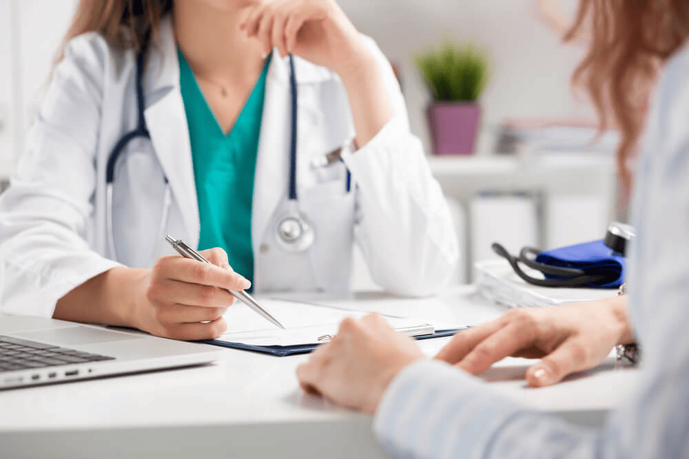 Healthcare professional meeting with a patient, representing specialist healthcare recruitment