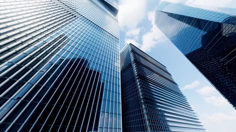 Modern commercial buildings representing logistics and transport businesses