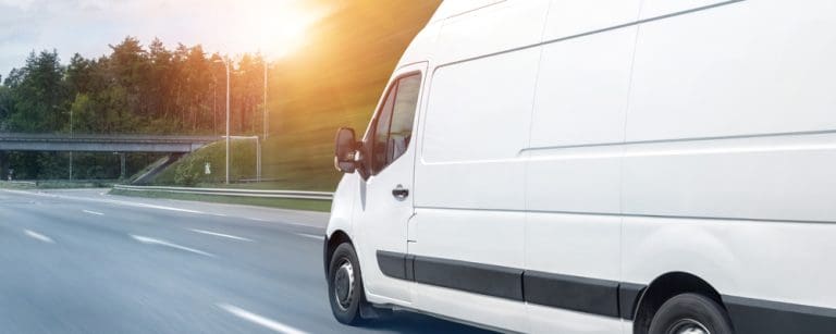 Commercial delivery van transporting goods as part of a logistics and distribution business